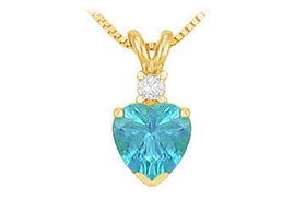 Diamond and Blue Topaz Solitaire Pendant : 14K Yellow Gold - 1.00 CT TGWdiamond 