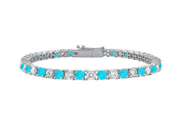 Blue Topaz and Cubic Zirconia Prong Set 10K White Gold Tennis Bracelet 2.00 CT TGW