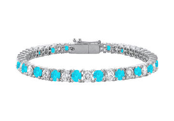 Blue Topaz and Cubic Zirconia Prong Set 10K White Gold Tennis Bracelet 7.00 CT TGW